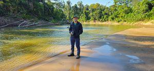 Standing at an isolated beach